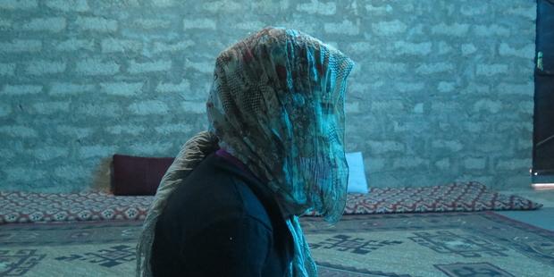 205074_a_girl_in_khakhe_camp_who_was_a_victim_of_islamic_state_abuse.jpg