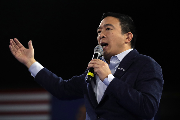 Democratic presidential candidate Andrew Yang speaks during the 100 Club Dinner at SNHIU