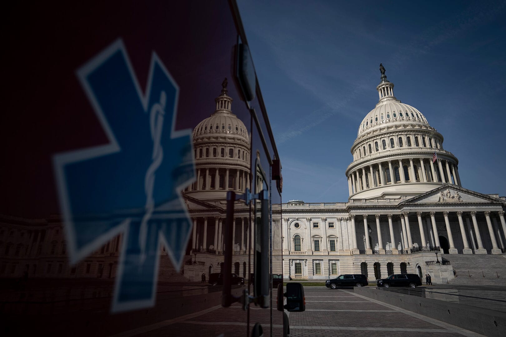 WASHINGTON, DC - MARCH 16: An ambulance sits parked on the plaza outside the U.S. Capitol March 16, 2020 in Washington, DC. After taking the weekend off, the Senate will return on Monday afternoon and will take up the House-passed coronavirus relief bill. The legislation in the House bill includes some provisions for paid emergency leave and free COVID-19 testing. (Photo by Drew Angerer/Getty Images)