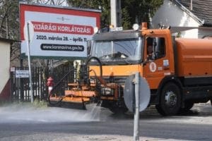 A lorry disinfects a street on March 30, 2020 in Budapest