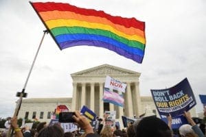 Demonstrators in favour of LGBT rights rally outside the US Supreme Court in Washington, DC