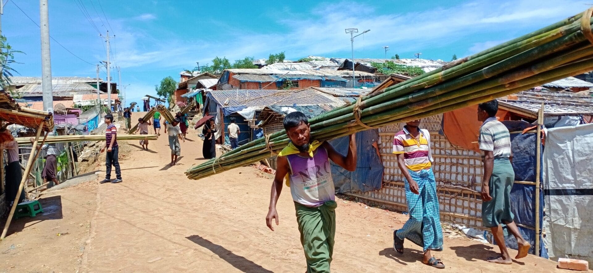 Man carries building materials