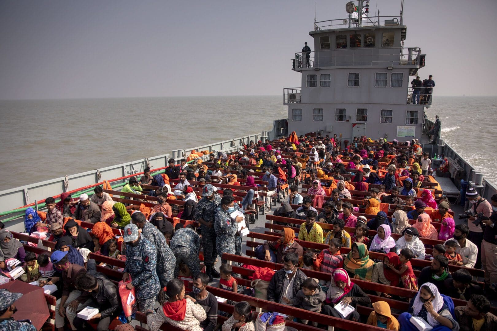 CHITTAGONG, BANGLADESH - 2020/12/29: Rohingya refugees people on a Bangladesh navy vessel relocating Rohingya refugees to the Bhasan Char island in Noakhali district, Bangladesh.