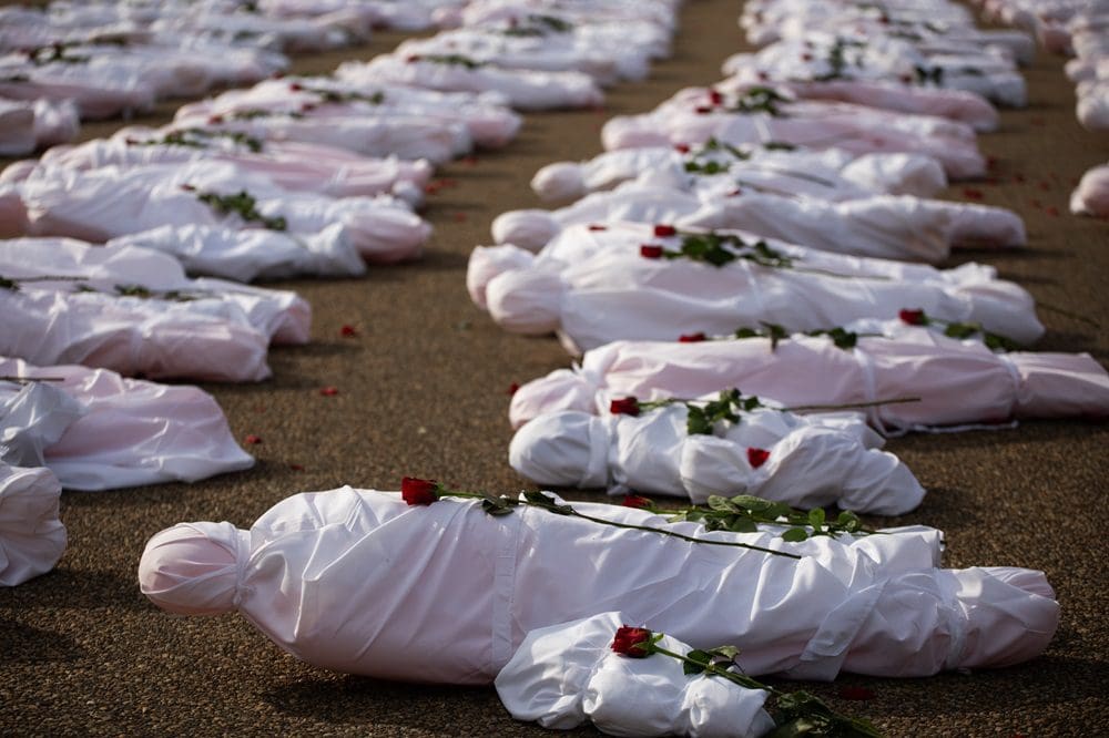 Body bags with roses in Ceasefire Now demonstration at White House