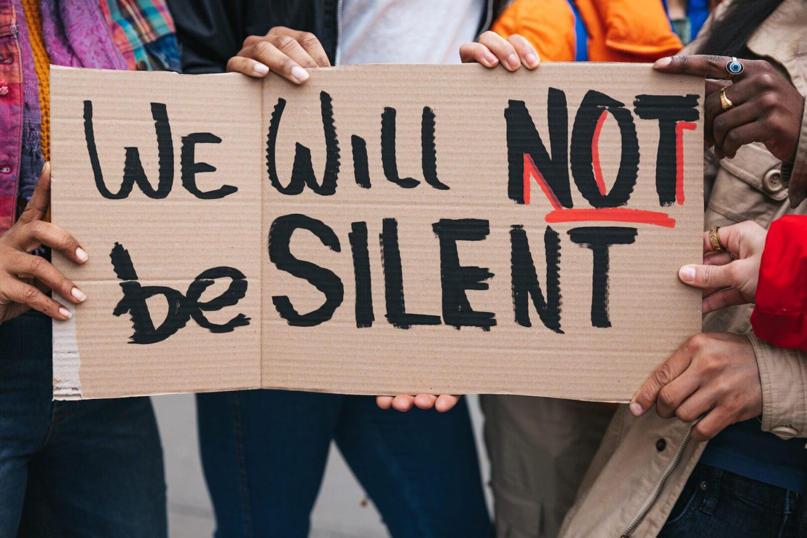 cardboard sign saying