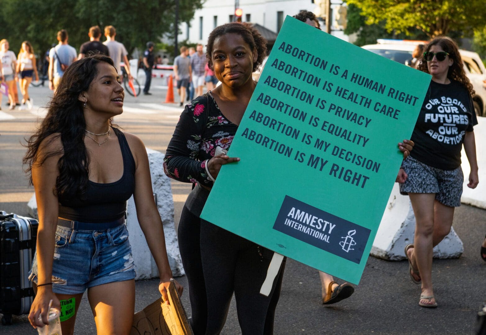 woman at Amnesty International abortion protest