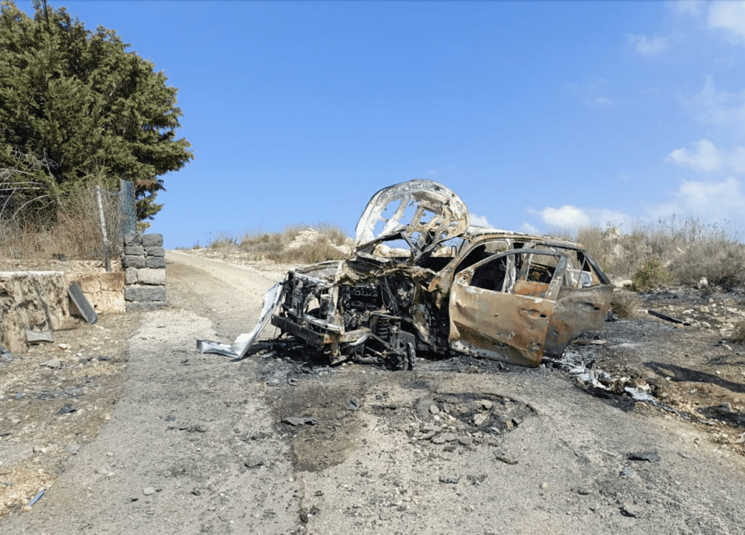 Second crater near the front tyre of the Al Jazeera vehicle.