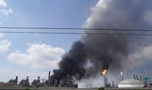 A fire burns at a Shell chemical facility in Deer Park, Friday, May 5, 2023, east of Houston. A chemical plant in the Houston area has caught fire, sending a huge plume of smoke into the sky. The Harris County Sheriff's Office said Friday the fire was at a Shell USA Inc. facility in Deer Park, a suburb east of Houston. (Elizabeth Conley/Houston Chronicle via AP)