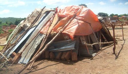 Those who lost their homes made a variety of temporary living arrangements in the immediate aftermath of the demolitions. Some constructed temporary shelters out of the rubble, corrugated iron sheets and plastic sheeting, 26 November 2009.