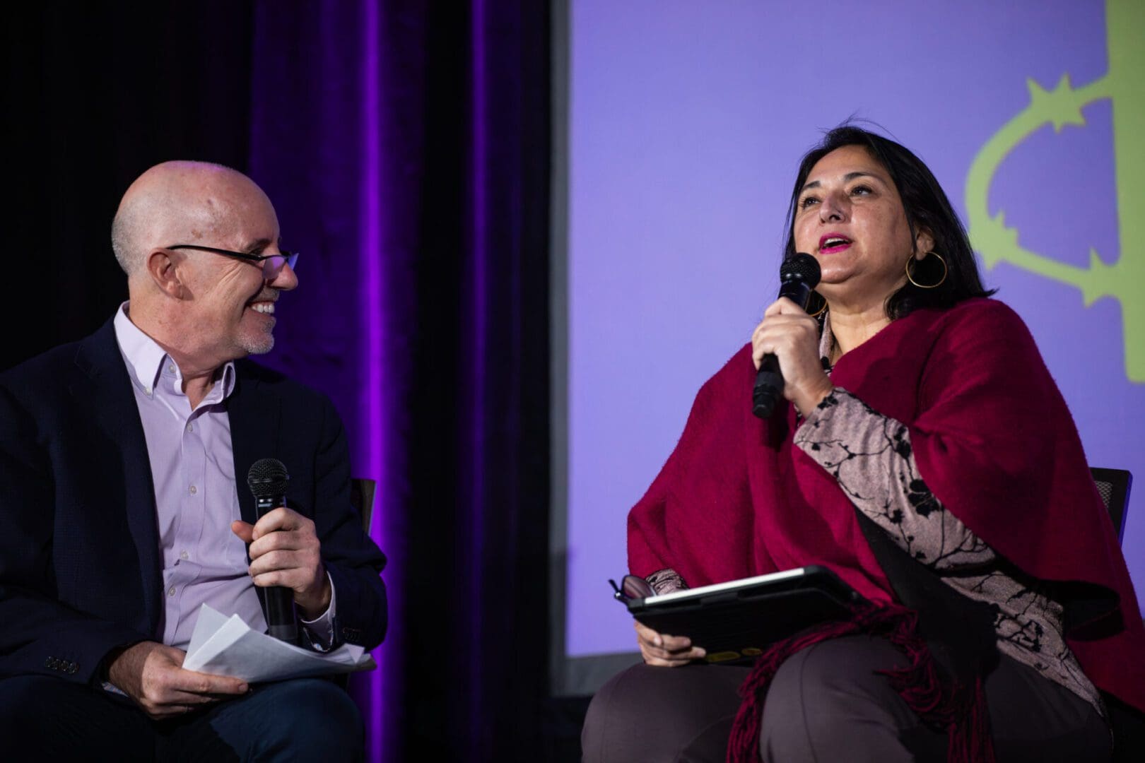 Paul O’Brien, Executive Director of Amnesty USA (left) moderates a panel that includes Shenilla Mohamed, Executive Director of Amnesty South Africa, speaking about “Shifting Power Nationally and Globally, All at once: Where do human rights fit in?”