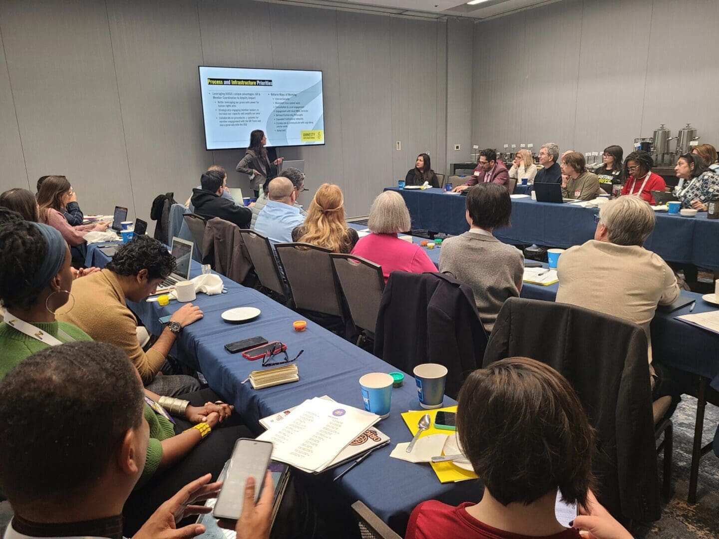 National Director of Government Relations and Advocacy Amanda Klasing welcomes Country and Thematic Specialists and international visitors to the AGM. (Raina Fox)