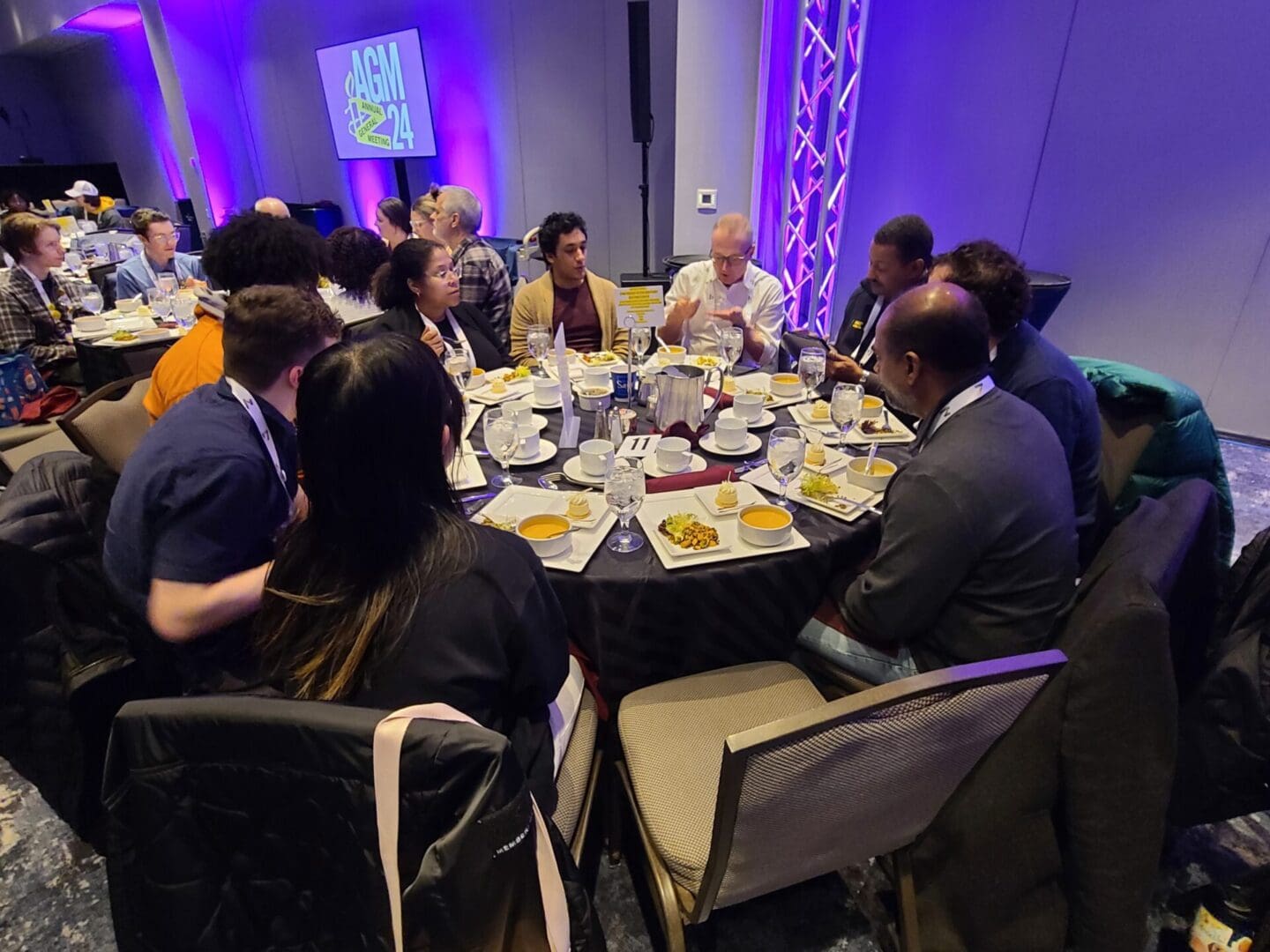 Irungu Houghton, Executive Director of Amnesty Kenya (top right in black jacket) leads a conversation about artificial intelligence and human rights.