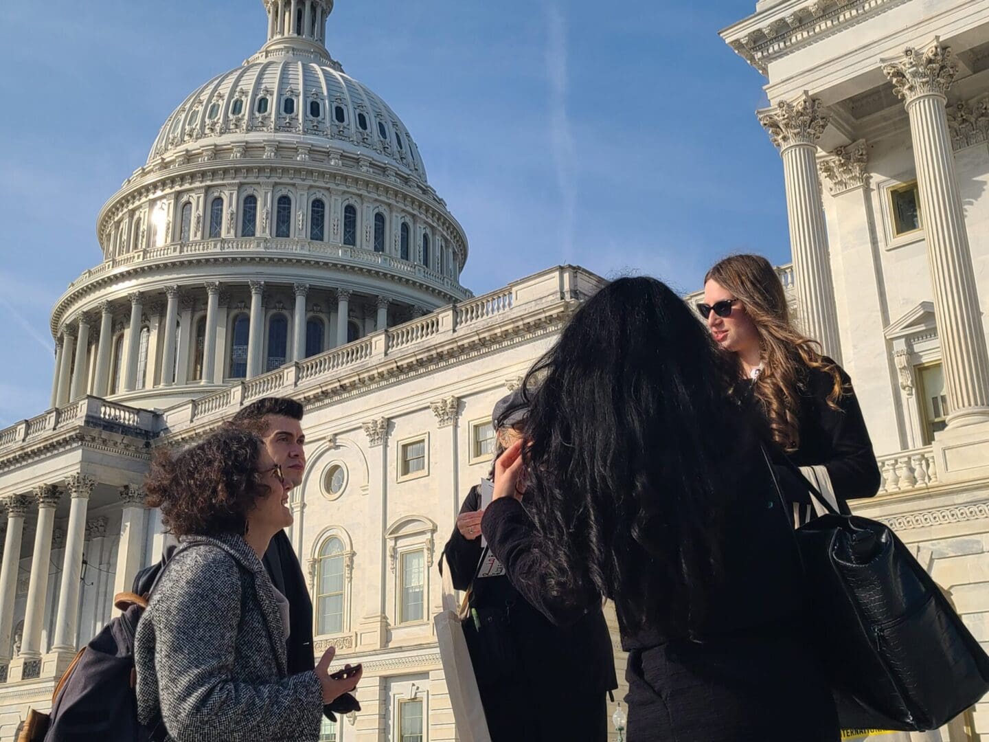 Amnesty France’s Executive Director Sylvie Brigot (left) joins California Members lobbying their representatives about the Safeguard Act.