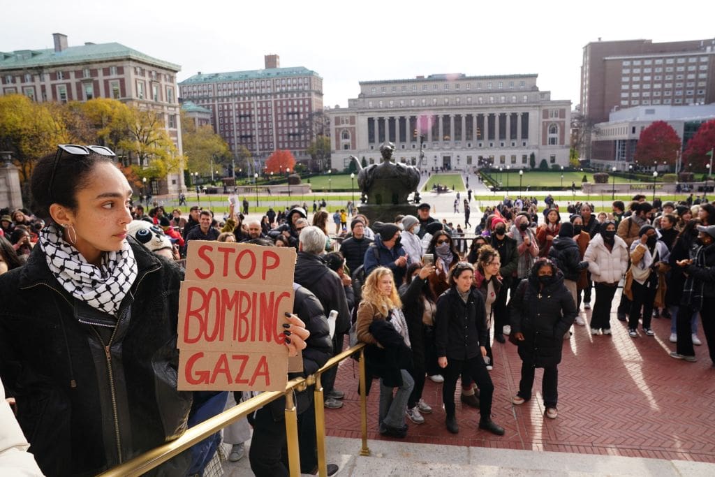 Demonstrators rally at a