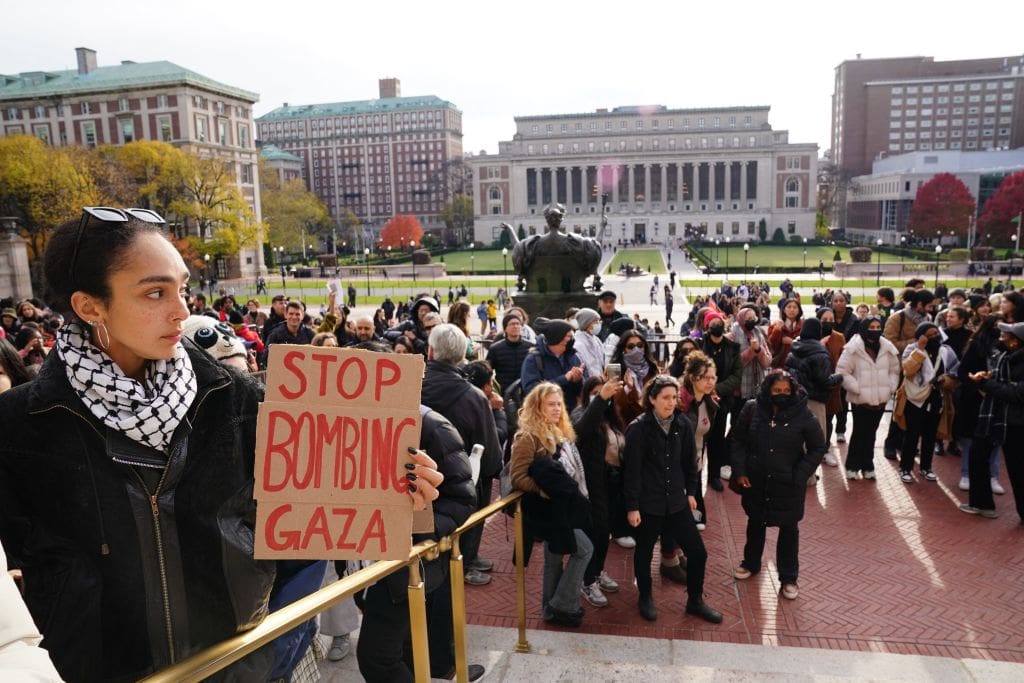 Demonstrators rally at a 