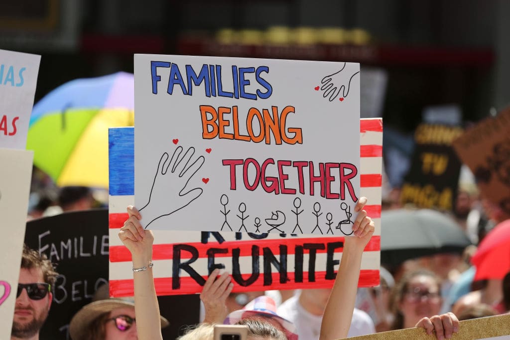 CHICAGO, June 30, 2018 -- A protester holds a placard during the