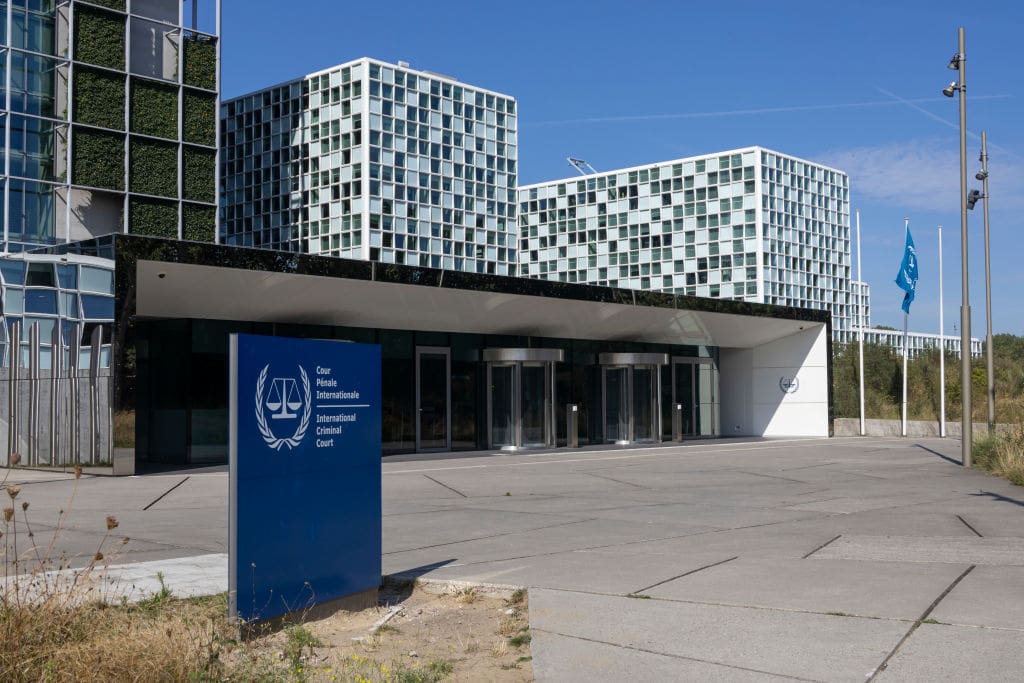 General view with a sign with the official logo and inscription of the International Criminal Court ICC or ICCt, an intergovernmental organization and international tribunal seated in The Hague, Netherlands. The ICC is distinct from the International Court of Justice, an organ of the United Nations that hears disputes between states. September 2024 (Photo by Nicolas Economou/NurPhoto via Getty Images)