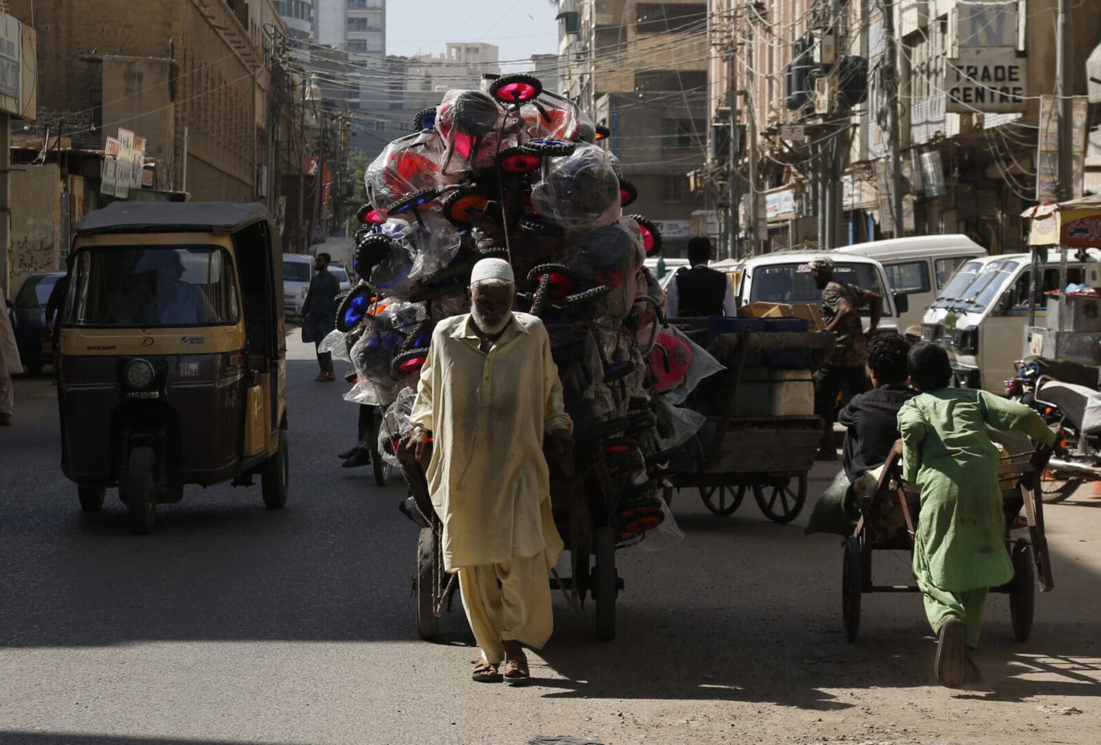 Hamza Baloch, 60, working outdoors in Karachi during record heat in October.