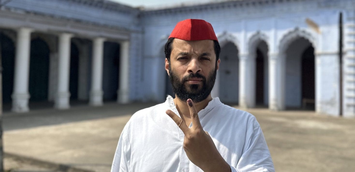 Professor Ali Khan Mahmudabad posing with a peace sign