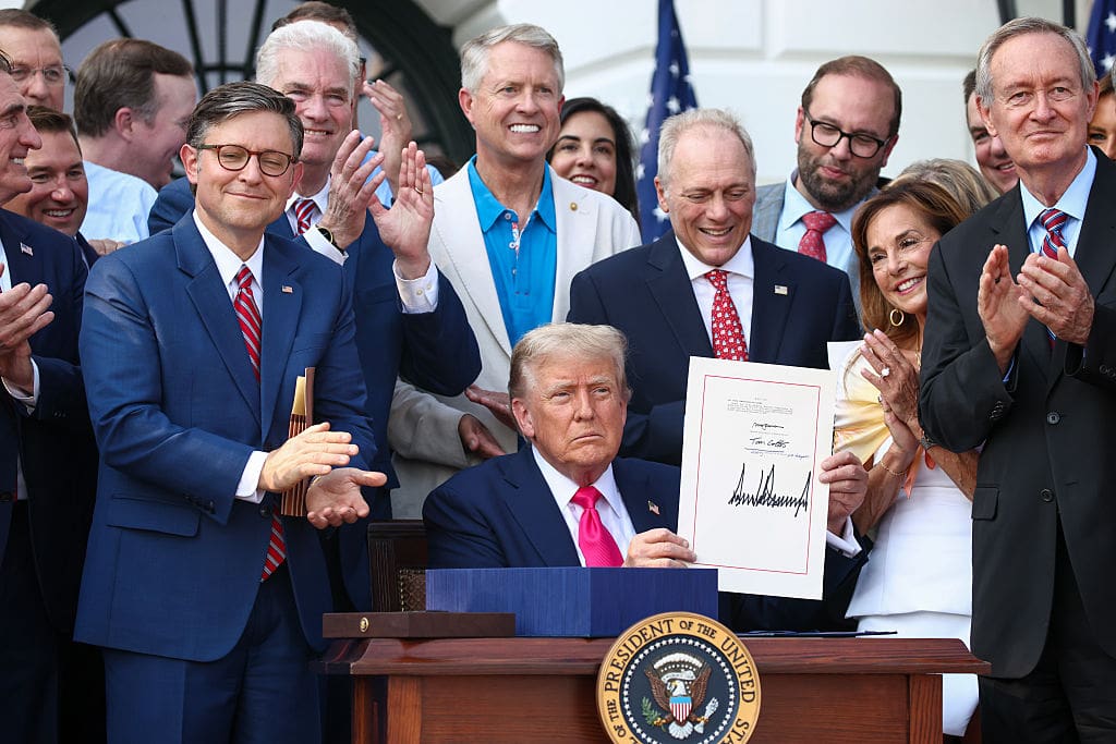 President Donald Trump, joined by Republican lawmakers, signs the One, Big Beautiful Bill Act into law