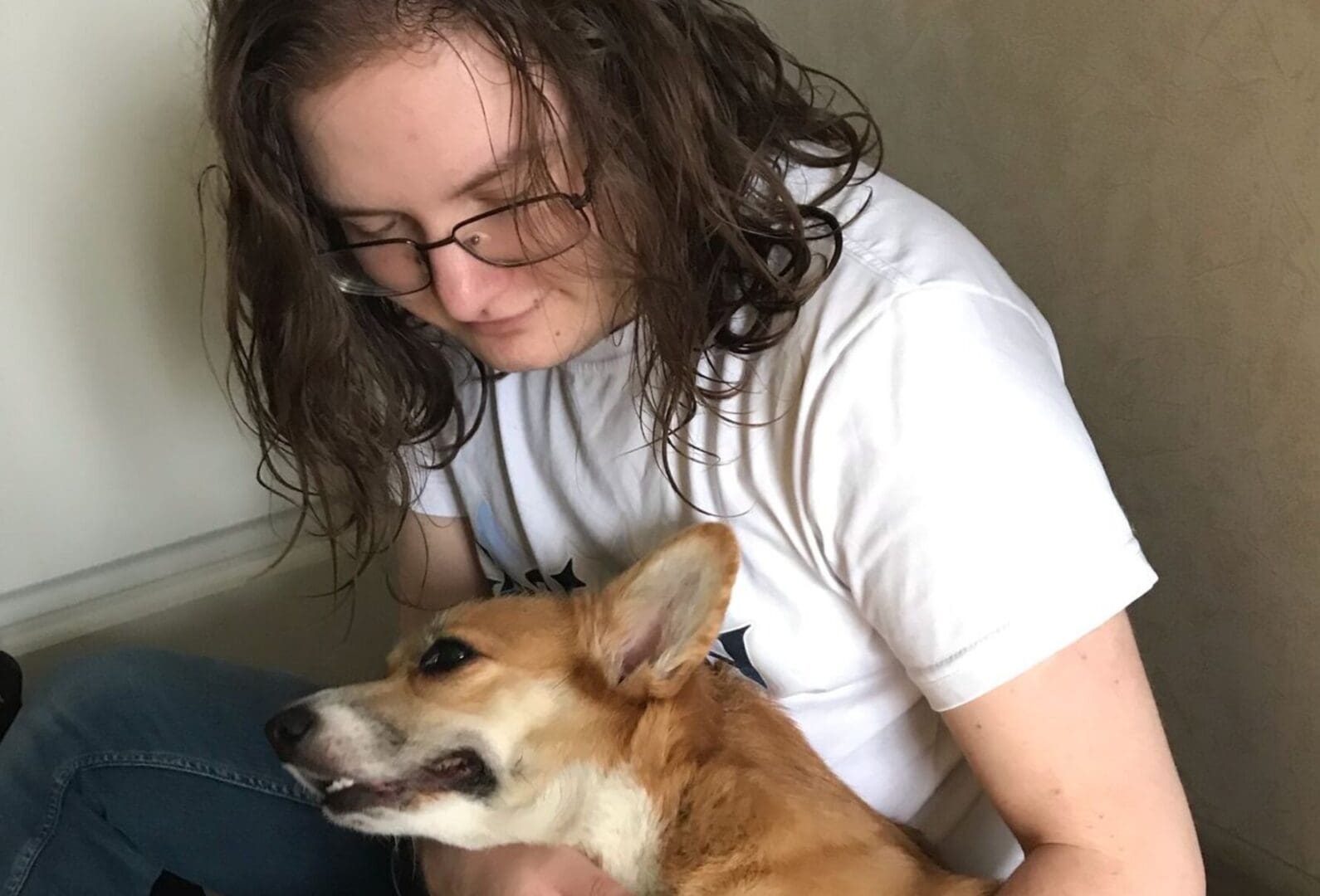 Mark Kislitsyn, Russian transgender rights and anti-war activist, depicted with a dog. Mark has been sentenced to 12 years in prison on 