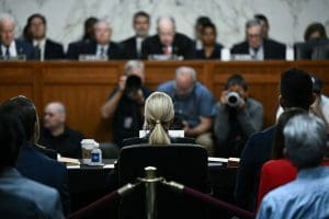 back of Attorney General Pam Bondi's head in front of Senate judiciary committee
