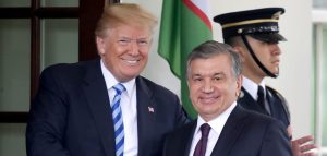 U.S. President Donald Trump shakes hands with Uzbekistan President Shavkat Mirziyoyev at the White House.