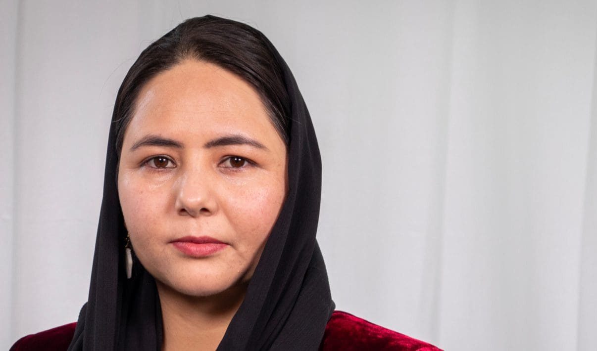 Portrait photo of Zahra Joya wearing a hijab.