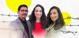 A photo of three smiling NGO workers, in front of image of barbed wire.