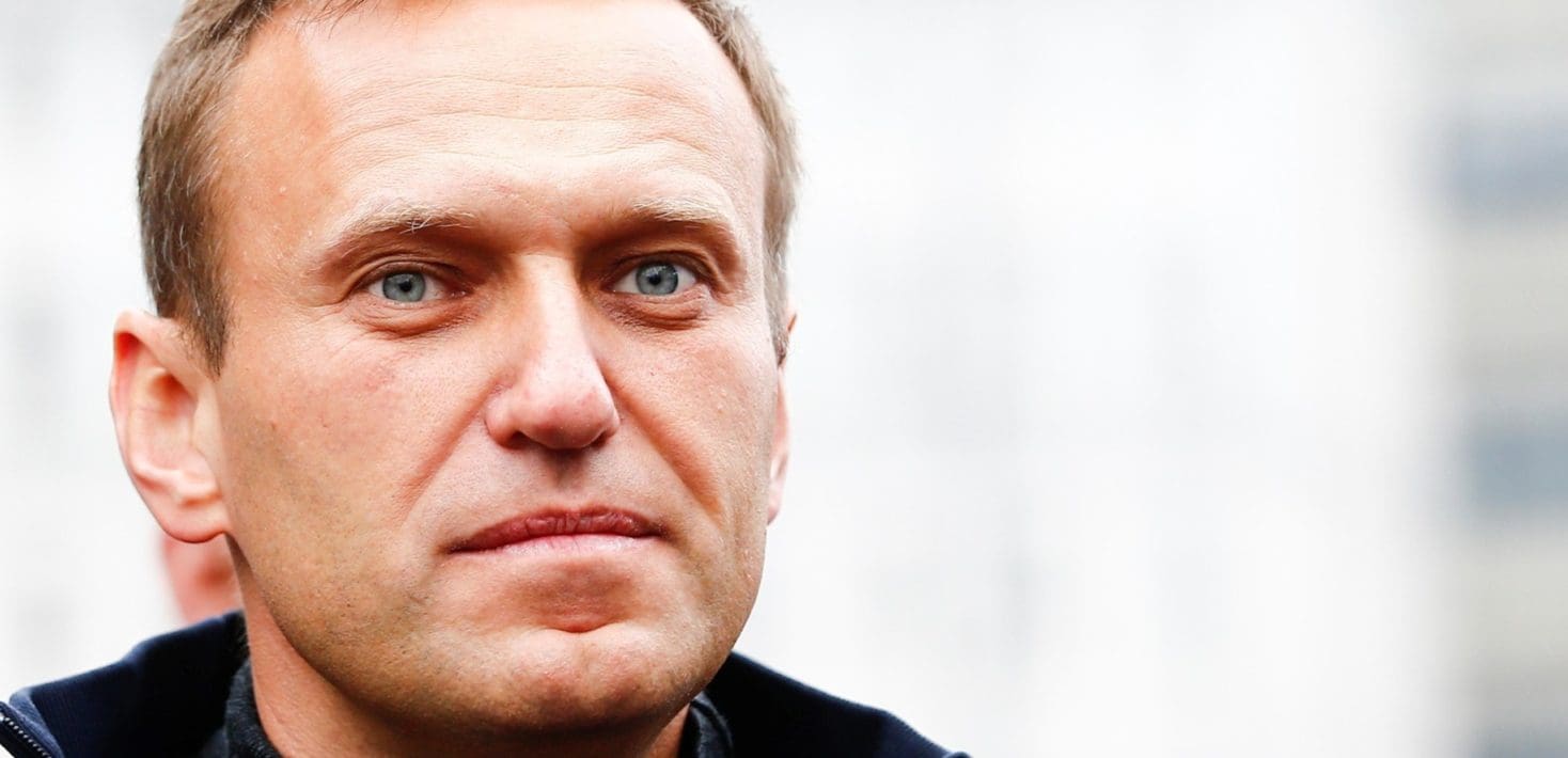 Alexei Navalny wearing a black shirt.