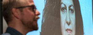 two faces, one of which is Yanar Mohammed