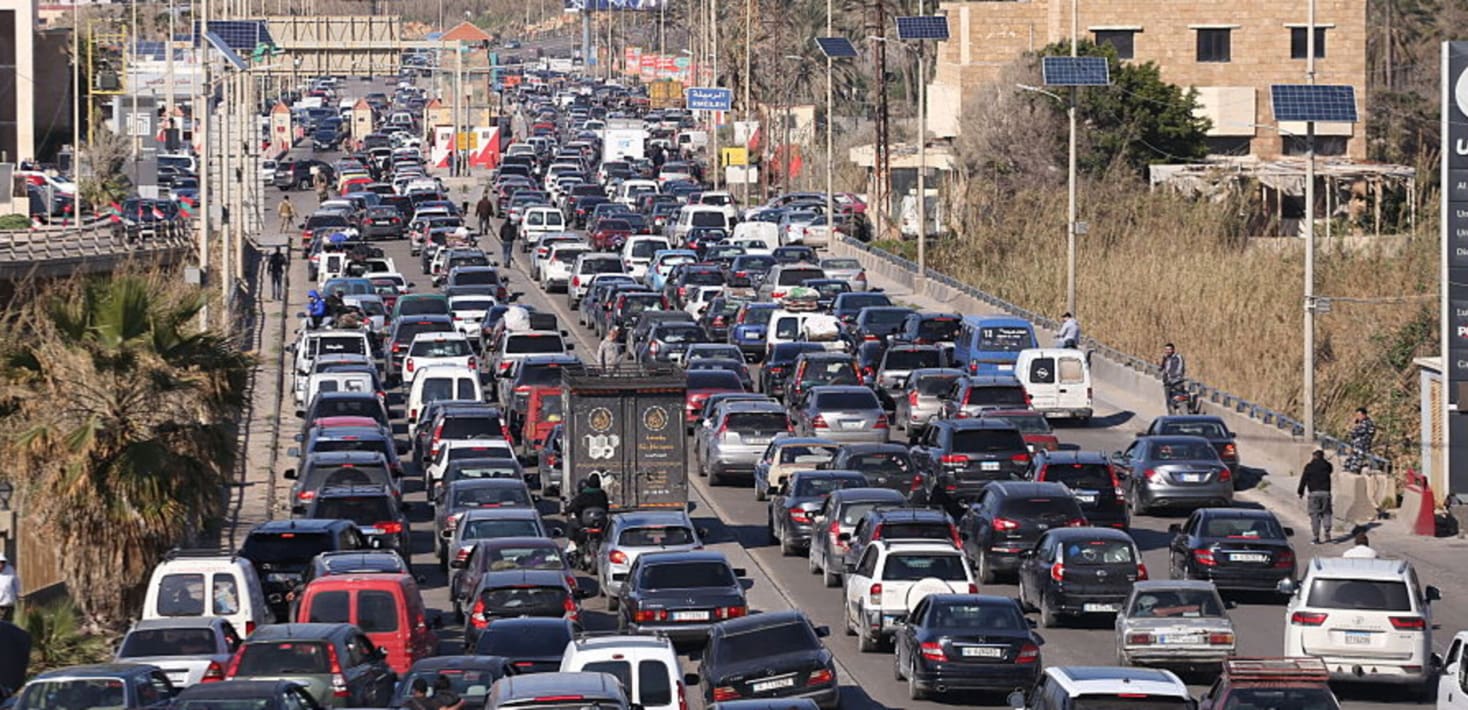 A photograph of congested traffic on a wide motorway.