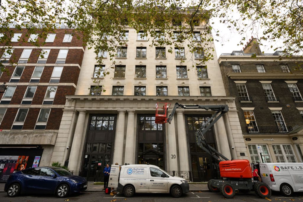 An exterior of a brown building.