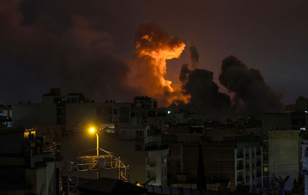 bomb in Iran's night sky