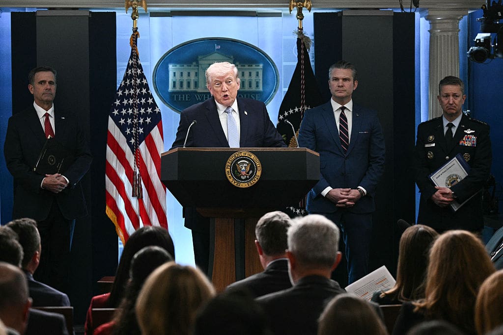 Trump speaking to a crowd, press conference