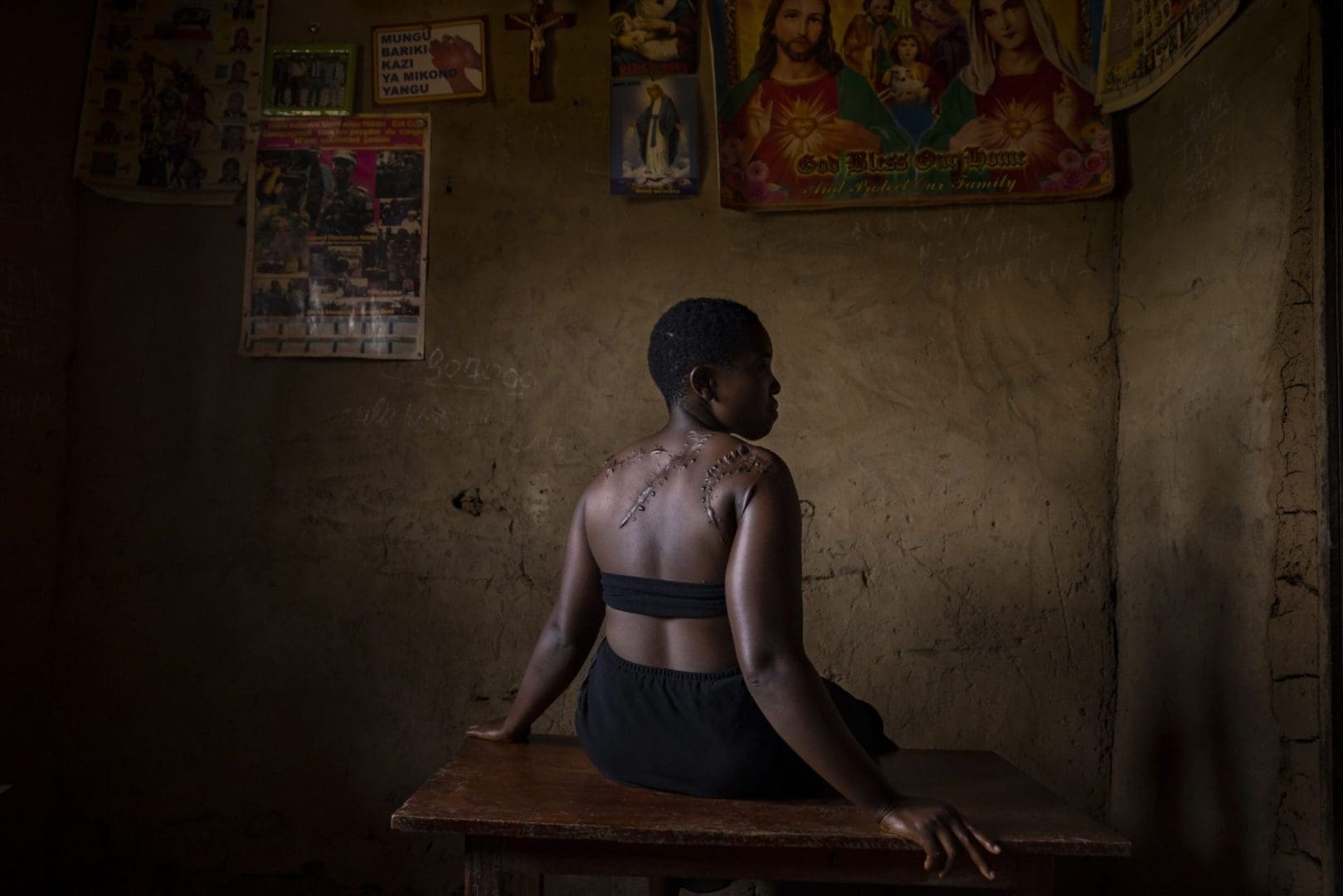 Georgette Ndovya Kavugho, 32, poses for a portrait on April 6, 2021 in Mbaou, Beni, Democratic Republic of the Congo. Georgette Ndovya Kavugho was attacked by members of the ADF Islamist group in her home