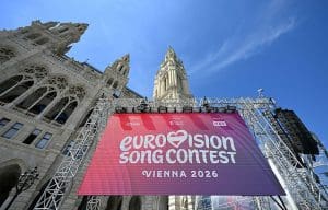 Eurovision Song Contest Vienna 2026 pink-purple banner.
