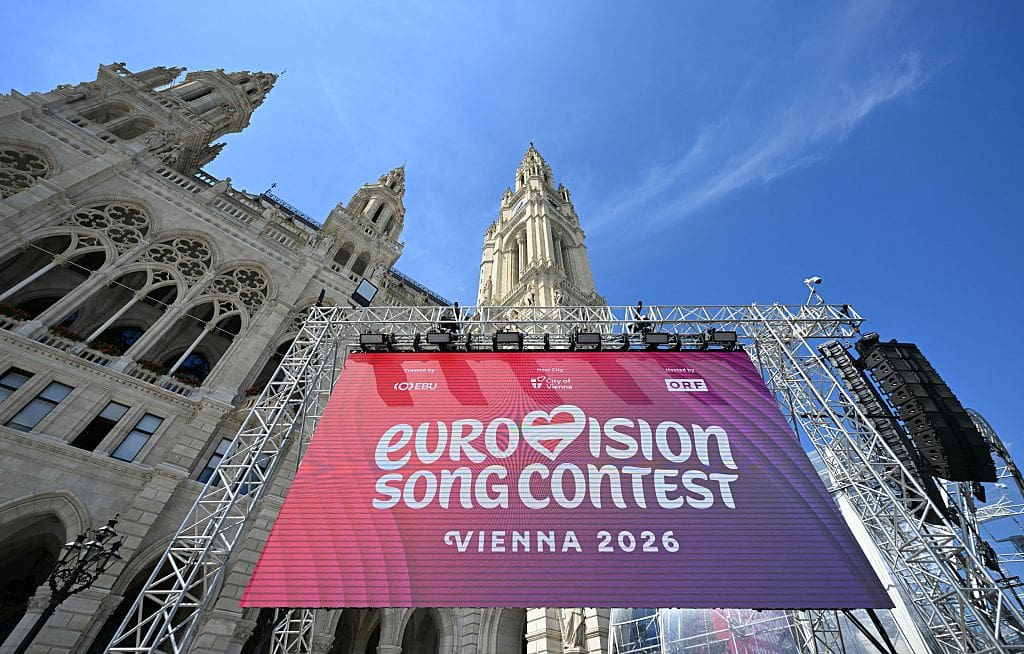 Eurovision Song Contest Vienna 2026 pink-purple banner.