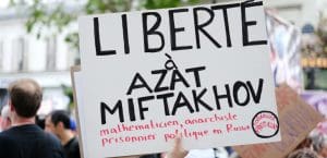 A protest placard written in Russian.