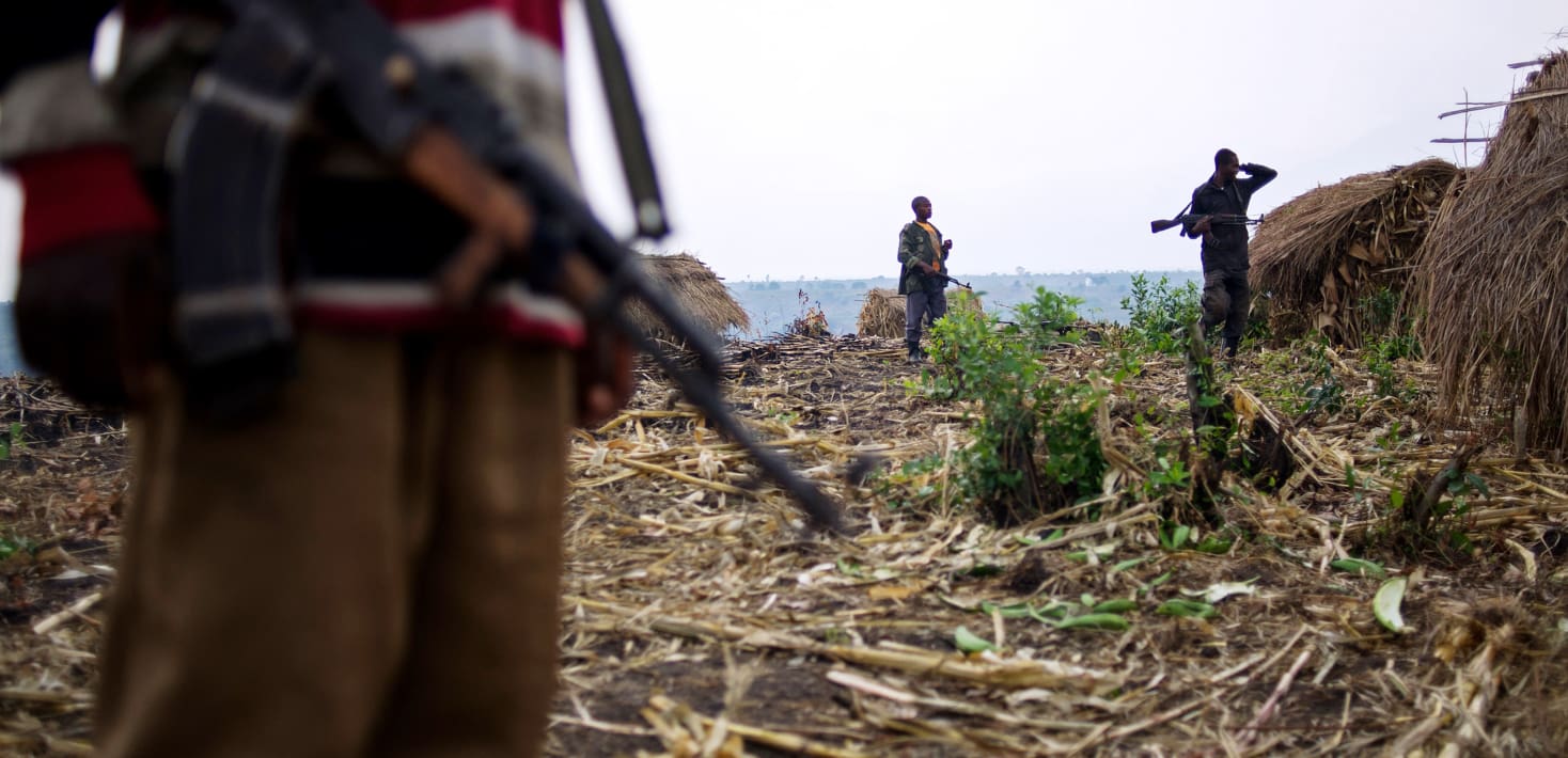 men with guns outside in DRC