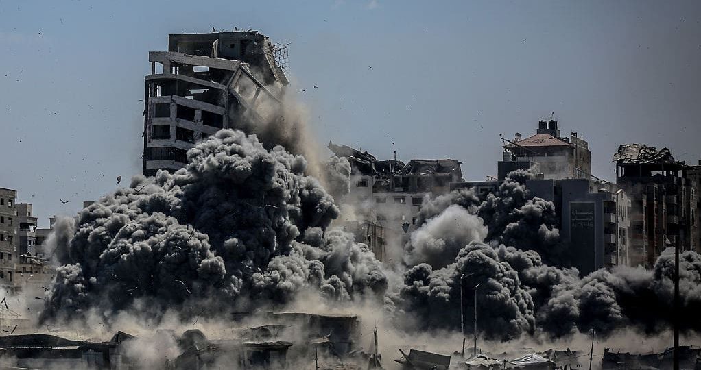 Smoke rises from the Harmony Tower, right after being bombed by Israeli forces in western Gaza City, Gaza on September 10, 2025.