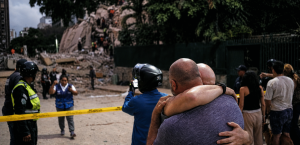 people hugging after earthquake