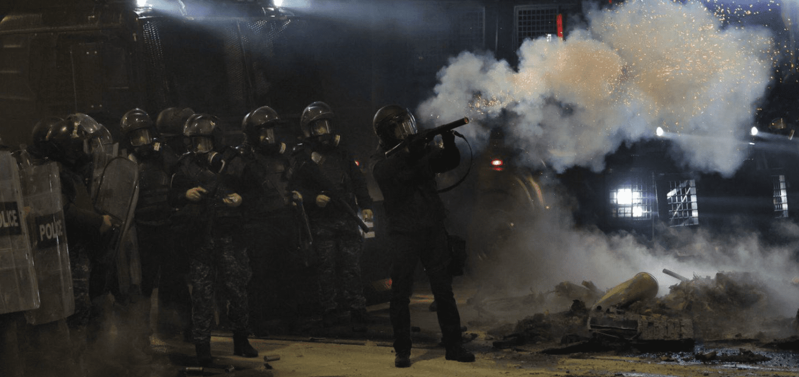 Police in Georgia firing tear gas at anti-government demonstrations in Central Tbilisi.