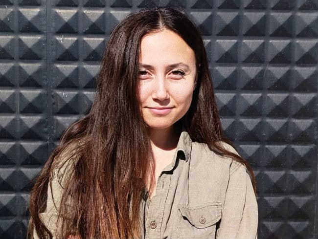 A young smiling woman