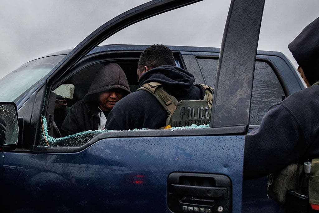 Customs and Border Patrol Agents (CBP) detain the driver of a vehicle after breaking the window in Kenner, Jefferson Parish, during Operation Catahoula Crunch in New Orleans, USA on December 4, 2025.