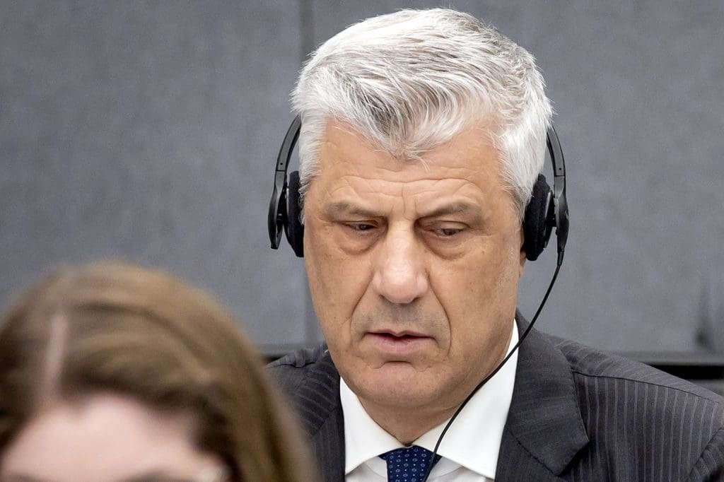A man wearing translation headphones.