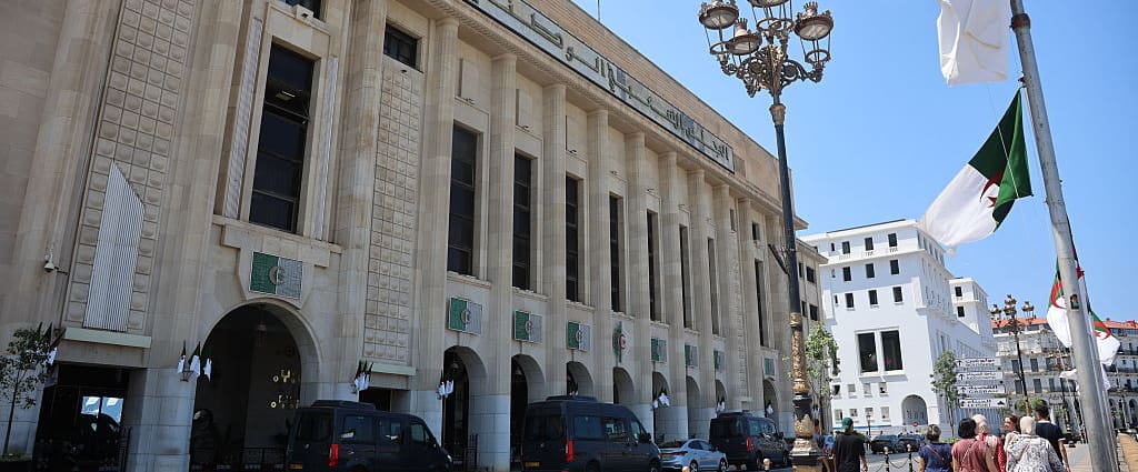 An official building in the afternoon sun.